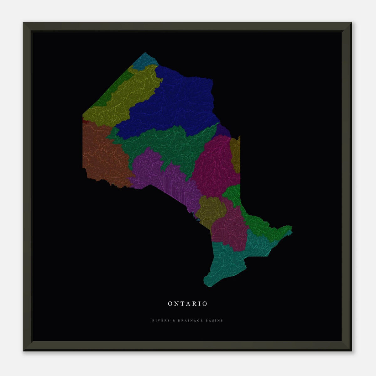 Ontario watershed map print, rivers coloured by drainage basin, framed, shown against a pale wall