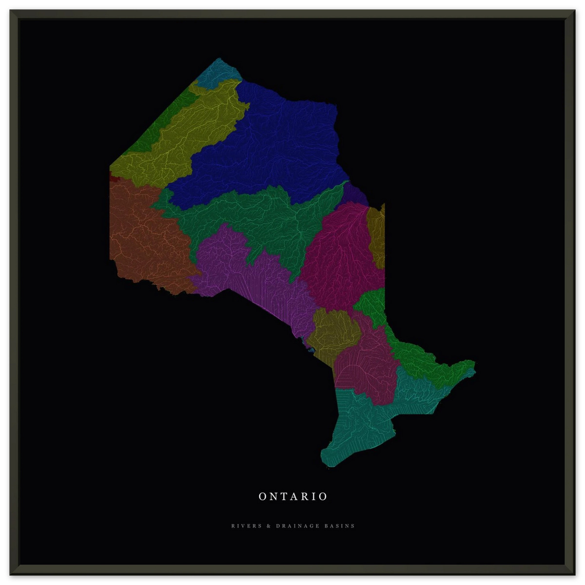 Ontario watershed map print, rivers coloured by drainage basin, in a black metal frame, alternate view